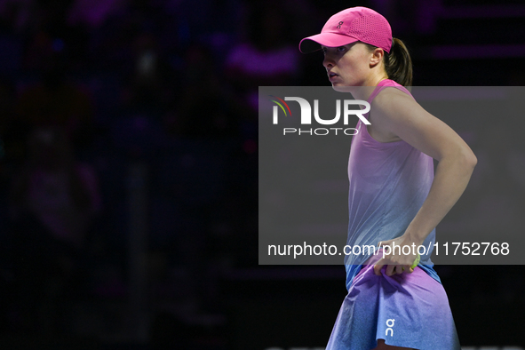 RIYADH, SAUDI ARABIA - NOVEMBER 07: Iga Swiatek of Poland during her match against Daria Kasatkina, on Day 6 of the 2024 WTA Finals, part of...