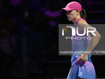 RIYADH, SAUDI ARABIA - NOVEMBER 07: Iga Swiatek of Poland during her match against Daria Kasatkina, on Day 6 of the 2024 WTA Finals, part of...