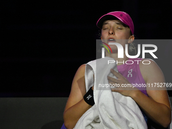 RIYADH, SAUDI ARABIA - NOVEMBER 07: Iga Swiatek of Poland during her match against Daria Kasatkina, on Day 6 of the 2024 WTA Finals, part of...