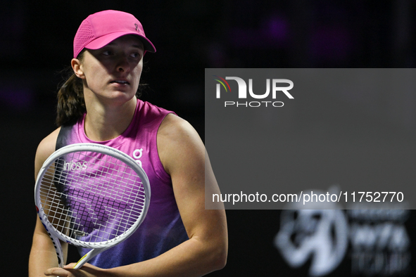 RIYADH, SAUDI ARABIA - NOVEMBER 07: Iga Swiatek of Poland during her match against Daria Kasatkina, on Day 6 of the 2024 WTA Finals, part of...