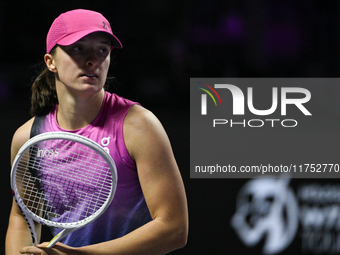 RIYADH, SAUDI ARABIA - NOVEMBER 07: Iga Swiatek of Poland during her match against Daria Kasatkina, on Day 6 of the 2024 WTA Finals, part of...