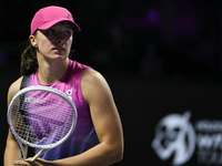 RIYADH, SAUDI ARABIA - NOVEMBER 07: Iga Swiatek of Poland during her match against Daria Kasatkina, on Day 6 of the 2024 WTA Finals, part of...