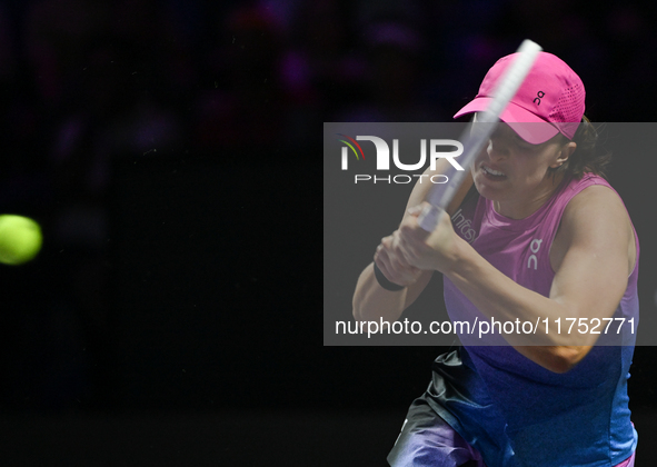 RIYADH, SAUDI ARABIA - NOVEMBER 07: Iga Swiatek of Poland during her match against Daria Kasatkina, on Day 6 of the 2024 WTA Finals, part of...