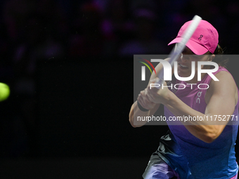 RIYADH, SAUDI ARABIA - NOVEMBER 07: Iga Swiatek of Poland during her match against Daria Kasatkina, on Day 6 of the 2024 WTA Finals, part of...