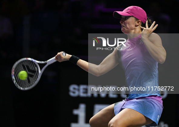 RIYADH, SAUDI ARABIA - NOVEMBER 07: Iga Swiatek of Poland during her match against Daria Kasatkina, on Day 6 of the 2024 WTA Finals, part of...