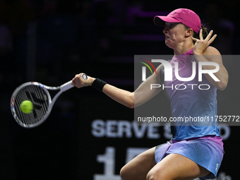 RIYADH, SAUDI ARABIA - NOVEMBER 07: Iga Swiatek of Poland during her match against Daria Kasatkina, on Day 6 of the 2024 WTA Finals, part of...