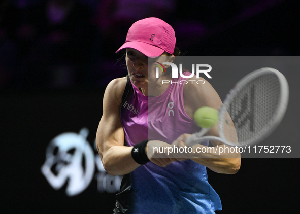 RIYADH, SAUDI ARABIA - NOVEMBER 07: Iga Swiatek of Poland during her match against Daria Kasatkina, on Day 6 of the 2024 WTA Finals, part of...