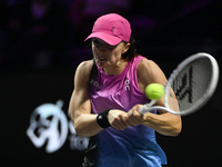 RIYADH, SAUDI ARABIA - NOVEMBER 07: Iga Swiatek of Poland during her match against Daria Kasatkina, on Day 6 of the 2024 WTA Finals, part of...