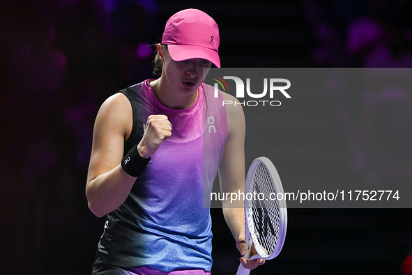 RIYADH, SAUDI ARABIA - NOVEMBER 07: Iga Swiatek of Poland during her match against Daria Kasatkina, on Day 6 of the 2024 WTA Finals, part of...