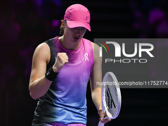 RIYADH, SAUDI ARABIA - NOVEMBER 07: Iga Swiatek of Poland during her match against Daria Kasatkina, on Day 6 of the 2024 WTA Finals, part of...