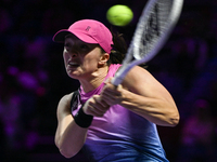 RIYADH, SAUDI ARABIA - NOVEMBER 07: Iga Swiatek of Poland during her match against Daria Kasatkina, on Day 6 of the 2024 WTA Finals, part of...