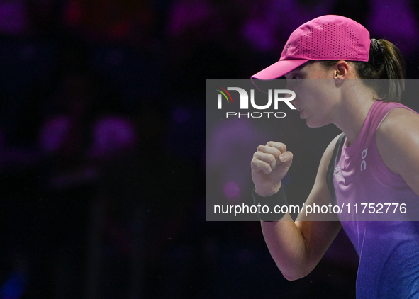 RIYADH, SAUDI ARABIA - NOVEMBER 07: Iga Swiatek of Poland during her match against Daria Kasatkina, on Day 6 of the 2024 WTA Finals, part of...