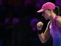 RIYADH, SAUDI ARABIA - NOVEMBER 07: Iga Swiatek of Poland during her match against Daria Kasatkina, on Day 6 of the 2024 WTA Finals, part of...