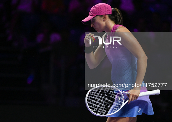 RIYADH, SAUDI ARABIA - NOVEMBER 07: Iga Swiatek of Poland during her match against Daria Kasatkina, on Day 6 of the 2024 WTA Finals, part of...