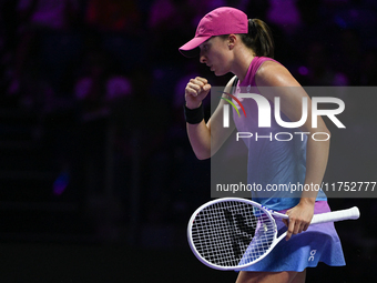 RIYADH, SAUDI ARABIA - NOVEMBER 07: Iga Swiatek of Poland during her match against Daria Kasatkina, on Day 6 of the 2024 WTA Finals, part of...