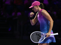 RIYADH, SAUDI ARABIA - NOVEMBER 07: Iga Swiatek of Poland during her match against Daria Kasatkina, on Day 6 of the 2024 WTA Finals, part of...