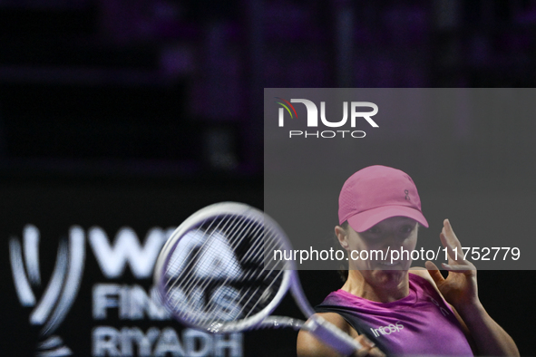 RIYADH, SAUDI ARABIA - NOVEMBER 07: Iga Swiatek of Poland during her match against Daria Kasatkina, on Day 6 of the 2024 WTA Finals, part of...