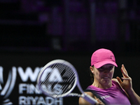 RIYADH, SAUDI ARABIA - NOVEMBER 07: Iga Swiatek of Poland during her match against Daria Kasatkina, on Day 6 of the 2024 WTA Finals, part of...