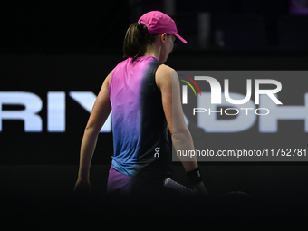 RIYADH, SAUDI ARABIA - NOVEMBER 07: Iga Swiatek of Poland during her match against Daria Kasatkina, on Day 6 of the 2024 WTA Finals, part of...