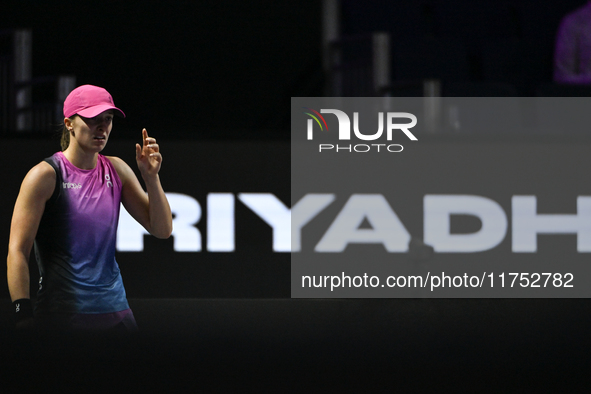 RIYADH, SAUDI ARABIA - NOVEMBER 07: Iga Swiatek of Poland during her match against Daria Kasatkina, on Day 6 of the 2024 WTA Finals, part of...