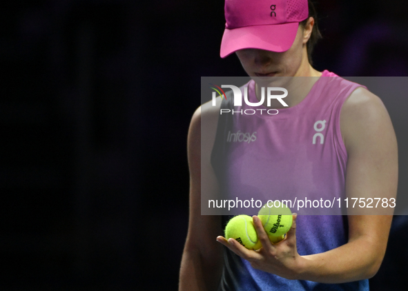 RIYADH, SAUDI ARABIA - NOVEMBER 07: Iga Swiatek of Poland during her match against Daria Kasatkina, on Day 6 of the 2024 WTA Finals, part of...