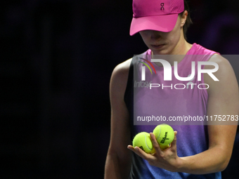 RIYADH, SAUDI ARABIA - NOVEMBER 07: Iga Swiatek of Poland during her match against Daria Kasatkina, on Day 6 of the 2024 WTA Finals, part of...