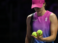 RIYADH, SAUDI ARABIA - NOVEMBER 07: Iga Swiatek of Poland during her match against Daria Kasatkina, on Day 6 of the 2024 WTA Finals, part of...