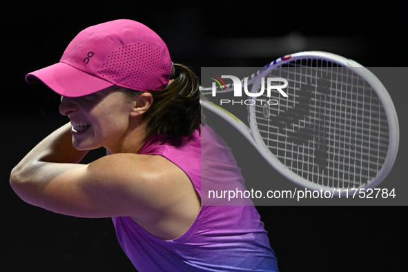 RIYADH, SAUDI ARABIA - NOVEMBER 07: Iga Swiatek of Poland during her match against Daria Kasatkina, on Day 6 of the 2024 WTA Finals, part of...