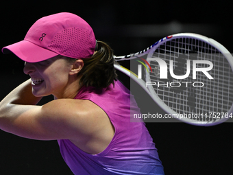 RIYADH, SAUDI ARABIA - NOVEMBER 07: Iga Swiatek of Poland during her match against Daria Kasatkina, on Day 6 of the 2024 WTA Finals, part of...