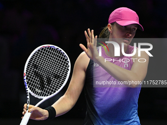 RIYADH, SAUDI ARABIA - NOVEMBER 07: Iga Swiatek of Poland during her match against Daria Kasatkina, on Day 6 of the 2024 WTA Finals, part of...