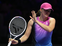 RIYADH, SAUDI ARABIA - NOVEMBER 07: Iga Swiatek of Poland during her match against Daria Kasatkina, on Day 6 of the 2024 WTA Finals, part of...