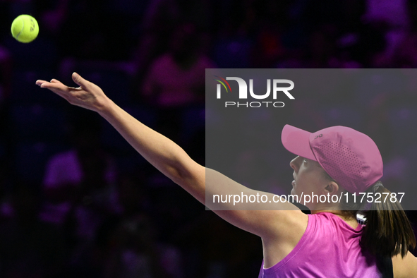 RIYADH, SAUDI ARABIA - NOVEMBER 07: Iga Swiatek of Poland during her match against Daria Kasatkina, on Day 6 of the 2024 WTA Finals, part of...