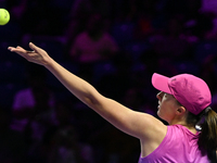 RIYADH, SAUDI ARABIA - NOVEMBER 07: Iga Swiatek of Poland during her match against Daria Kasatkina, on Day 6 of the 2024 WTA Finals, part of...