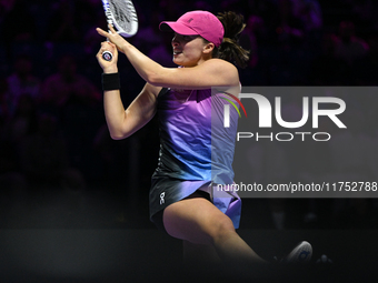 RIYADH, SAUDI ARABIA - NOVEMBER 07: Iga Swiatek of Poland during her match against Daria Kasatkina, on Day 6 of the 2024 WTA Finals, part of...