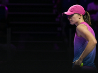 RIYADH, SAUDI ARABIA - NOVEMBER 07: Iga Swiatek of Poland during her match against Daria Kasatkina, on Day 6 of the 2024 WTA Finals, part of...