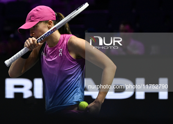 RIYADH, SAUDI ARABIA - NOVEMBER 07: Iga Swiatek of Poland during her match against Daria Kasatkina, on Day 6 of the 2024 WTA Finals, part of...