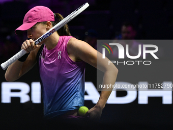 RIYADH, SAUDI ARABIA - NOVEMBER 07: Iga Swiatek of Poland during her match against Daria Kasatkina, on Day 6 of the 2024 WTA Finals, part of...