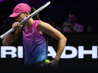 RIYADH, SAUDI ARABIA - NOVEMBER 07: Iga Swiatek of Poland during her match against Daria Kasatkina, on Day 6 of the 2024 WTA Finals, part of...