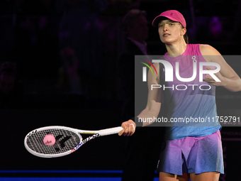 RIYADH, SAUDI ARABIA - NOVEMBER 07: Iga Swiatek of Poland during her match against Daria Kasatkina, on Day 6 of the 2024 WTA Finals, part of...