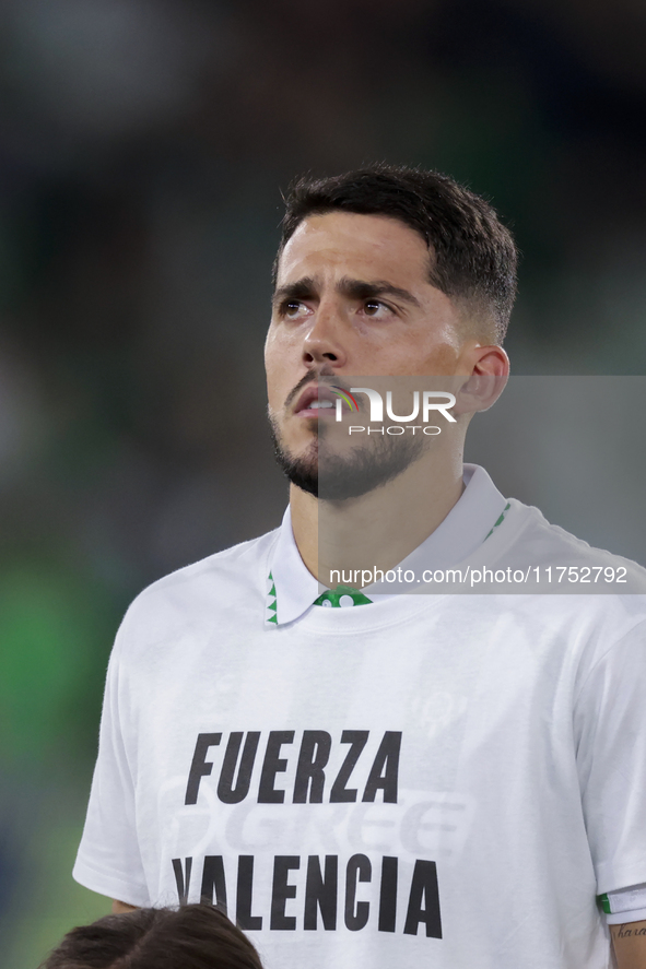 Pablo Fornals of Real Betis poses with a t-shirt supporting the province of Valencia during the UEFA Conference League 2024/25 League Phase...