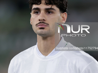 Johnny Cardoso of Real Betis poses with a t-shirt supporting the province of Valencia during the UEFA Conference League 2024/25 League Phase...