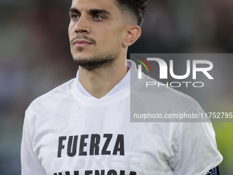 Marc Bartra of Real Betis poses with a t-shirt supporting the province of Valencia during the UEFA Conference League 2024/25 League Phase MD...