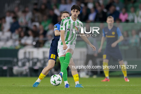 Johnny Cardoso of Real Betis passes the ball during the UEFA Conference League 2024/25 League Phase MD3 match between Real Betis and NK Celj...