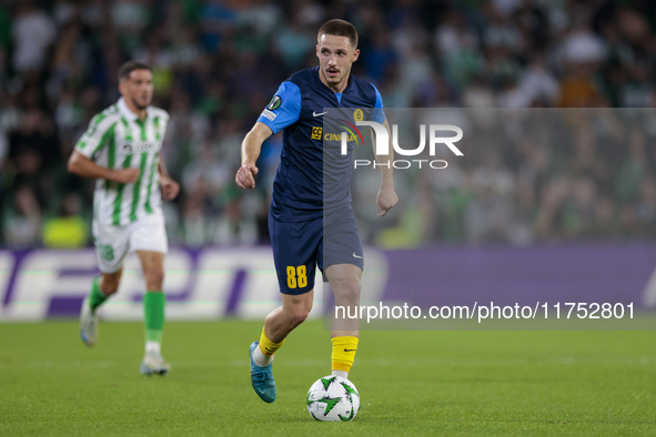 Tamar Svetin of NK Celje runs with the ball during the UEFA Conference League 2024/25 League Phase MD3 match between Real Betis and NK Celje...