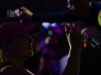 RIYADH, SAUDI ARABIA - NOVEMBER 07: Iga Swiatek of Poland interacts with fans after her victory over Daria Kasatkina on Day 6 of the 2024 WT...