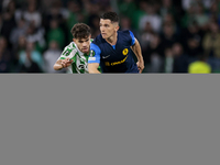 Juanjo Nieto of NK Celje competes for the ball with Ez Abde of Real Betis during the UEFA Conference League 2024/25 League Phase MD3 match b...