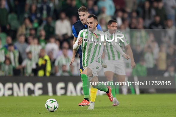 Juanmi of Real Betis runs with the ball during the UEFA Conference League 2024/25 League Phase MD3 match between Real Betis and NK Celje at...