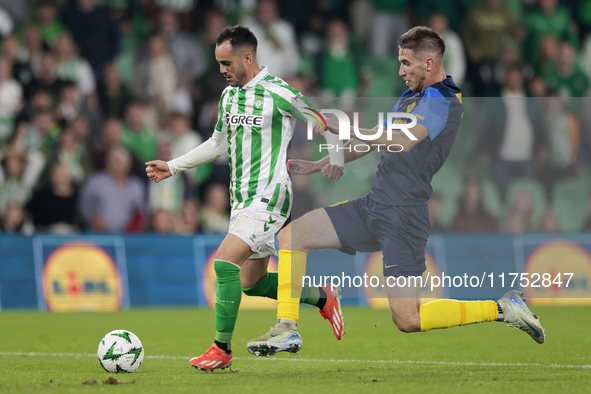 Juanmi of Real Betis runs with the ball during the UEFA Conference League 2024/25 League Phase MD3 match between Real Betis and NK Celje at...