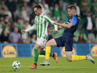 Juanmi of Real Betis runs with the ball during the UEFA Conference League 2024/25 League Phase MD3 match between Real Betis and NK Celje at...