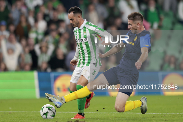 Juanmi of Real Betis hits the ball during the UEFA Conference League 2024/25 League Phase MD3 match between Real Betis and NK Celje at Benit...